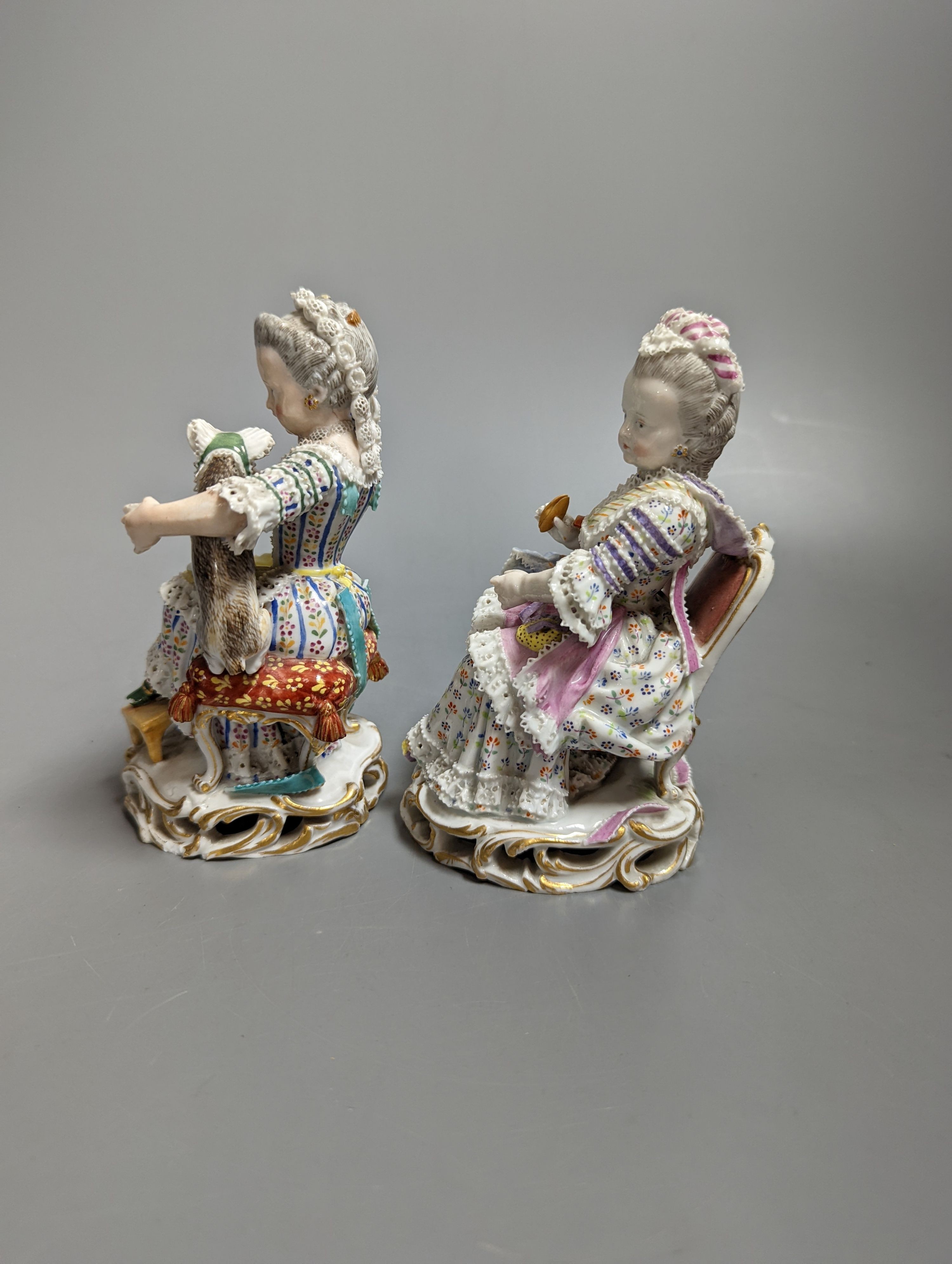 Two 19th century Meissen figures of seated ladies 13cms high